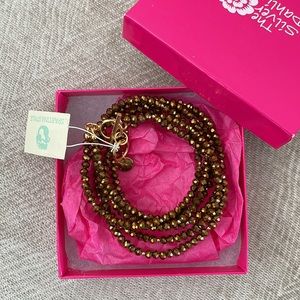 NWT Bead wrap that can be worn as a necklace or bracelet in metallic gold